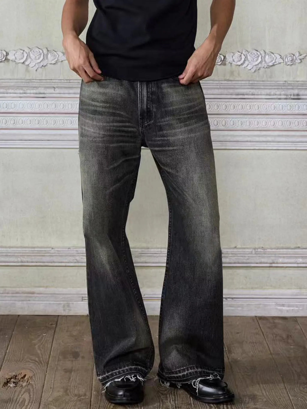 Men's vintage washed frayed hem jeans from Trendsi, showing distressed denim with a relaxed fit and frayed bottom hem.