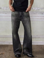 Men's vintage washed frayed hem jeans from Trendsi, showing distressed denim with a relaxed fit and frayed bottom hem.