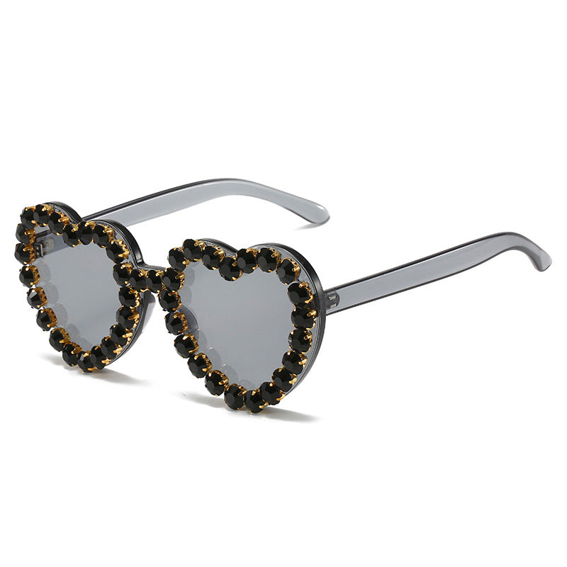 Peach heart-shaped rhinestone sunglasses by FitiqueFit featuring Y2K INS style eye wear with sparkling rhinestone accents.