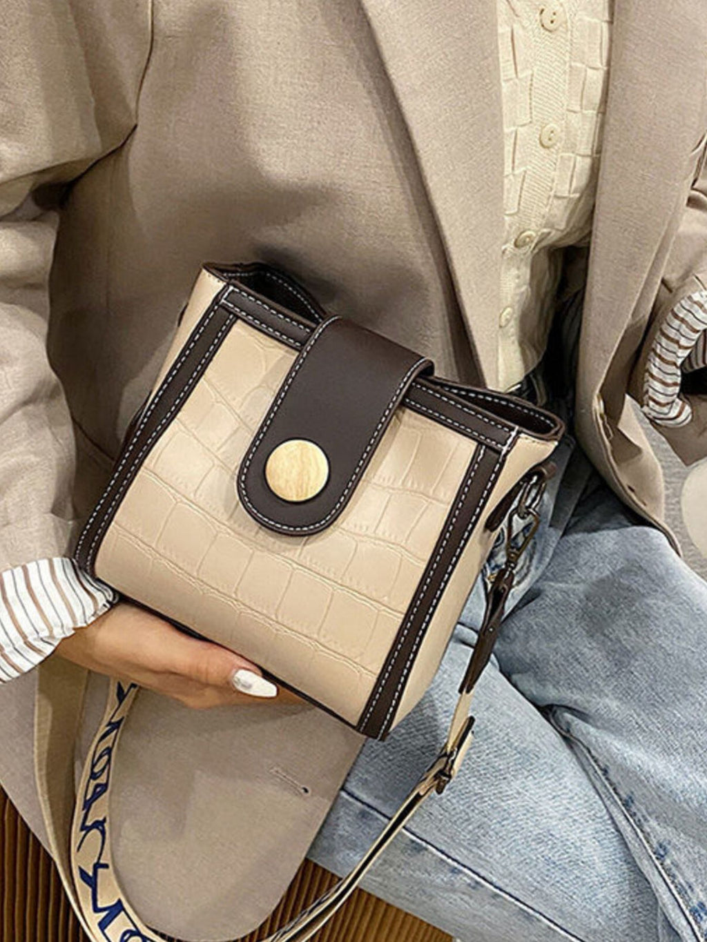 Crocodile embossed wide strap crossbody bag in premium PU leather with sleek design and spacious interior.