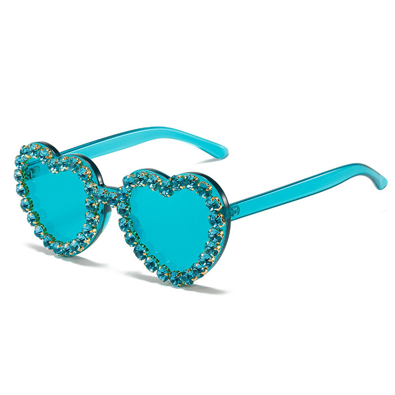 Peach heart-shaped rhinestone sunglasses from FitiqueFit, Y2K INS style eyewear with sparkly rhinestone details and bold design.