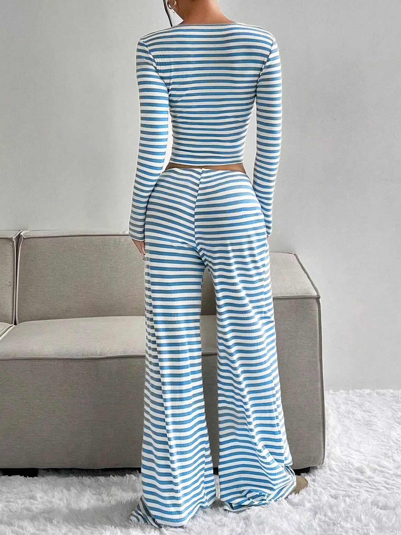 Striped long sleeve crop top and wide leg pants set by Trendsi, casual clothing ensemble with matching top and pants.