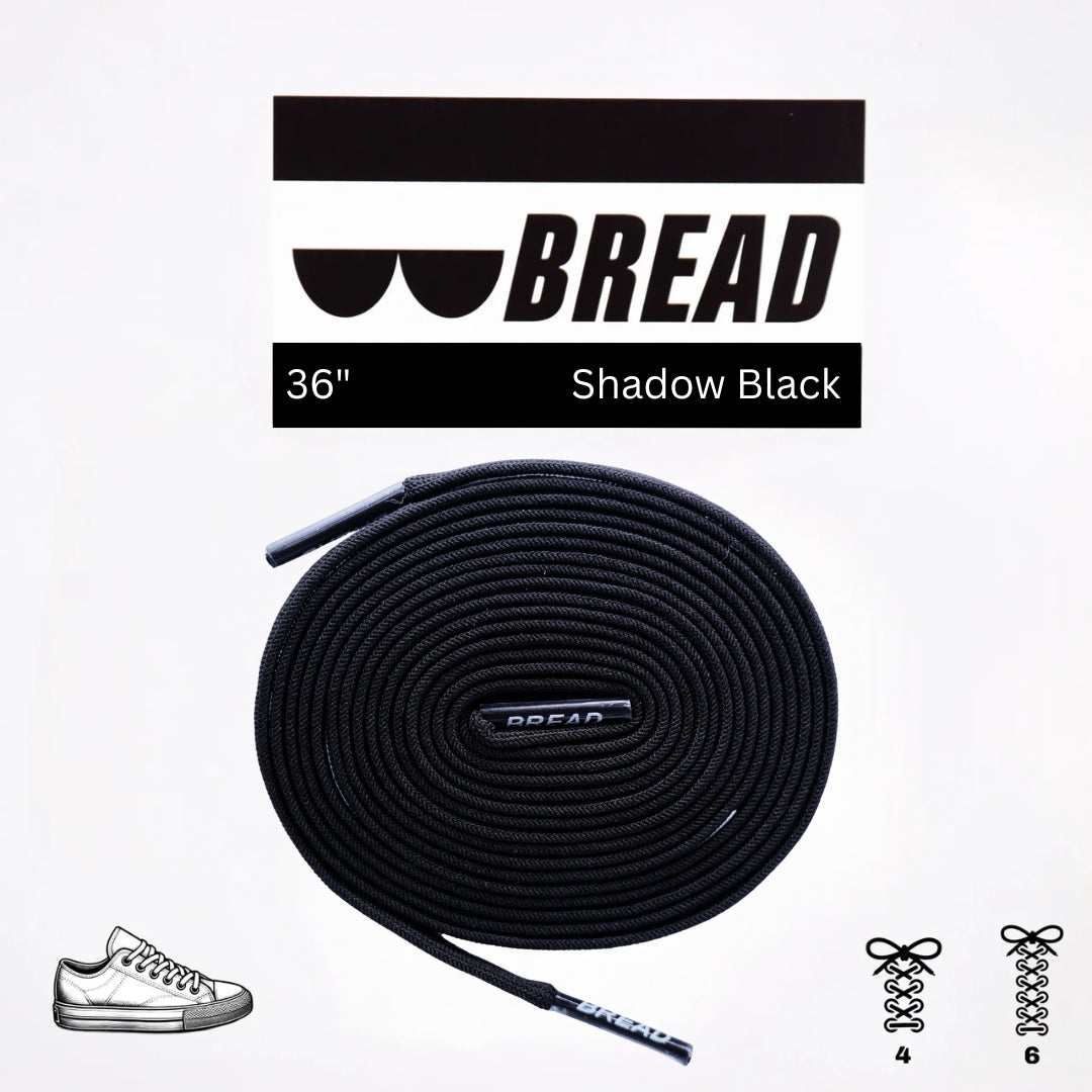 Black elastic shoelace by Bread, stylish and flexible for comfortable, slip-on sneakers or casual footwear.