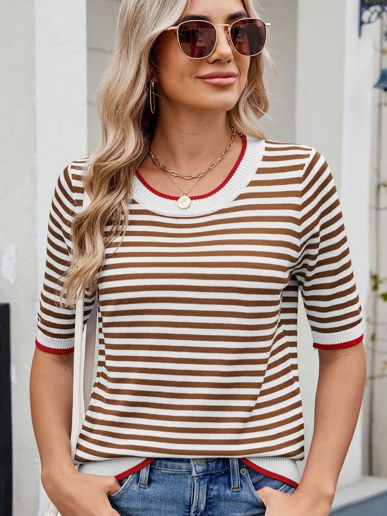 Striped casual T-shirt with contrast trim, trendy tops by Trendsi, showing the front view with bold stripes and stylish design.