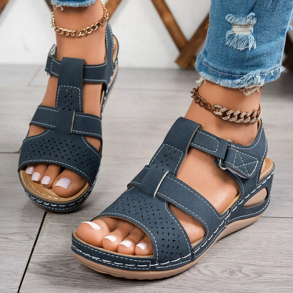 Open toe wedge sandals by Trendsi featuring a stylish design, ankle straps, and a comfortable cork wedge heel.