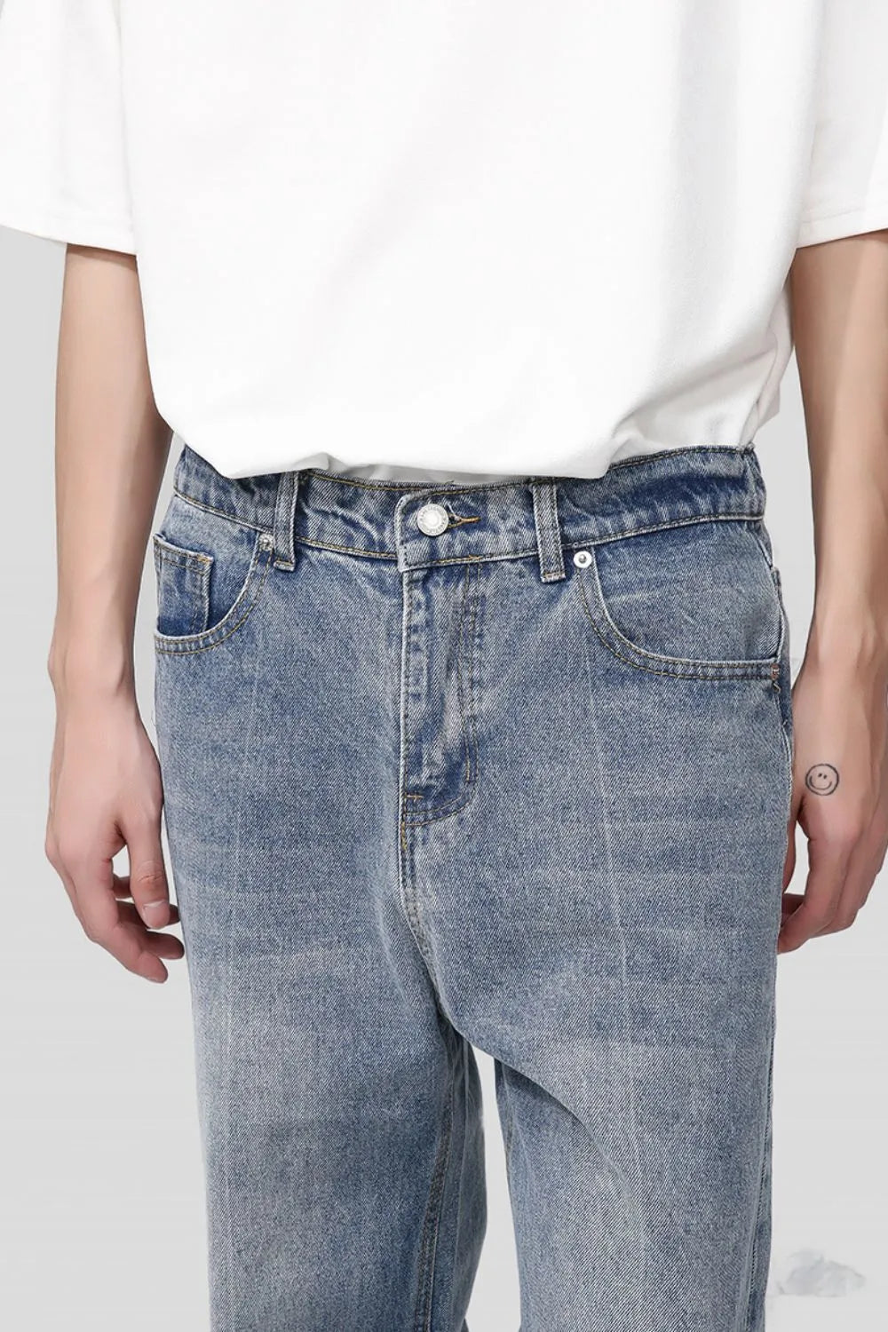 Light blue Plush Fashion Shop denim baggy jeans with large pockets and relaxed fit, displayed on a white background.