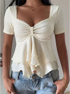 Sweetheart neck layered ruffle top by Trendsi featuring a feminine design with layered ruffles and a flattering neckline.