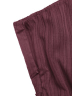 Elegant one-shoulder tie-waist romper jumpsuit in premium polyester, perfect for summer, from Trendsi.