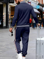 Men's plus size striped snap-down top and pants set by Trendsi, featuring a coordinated full-size casual outfit.