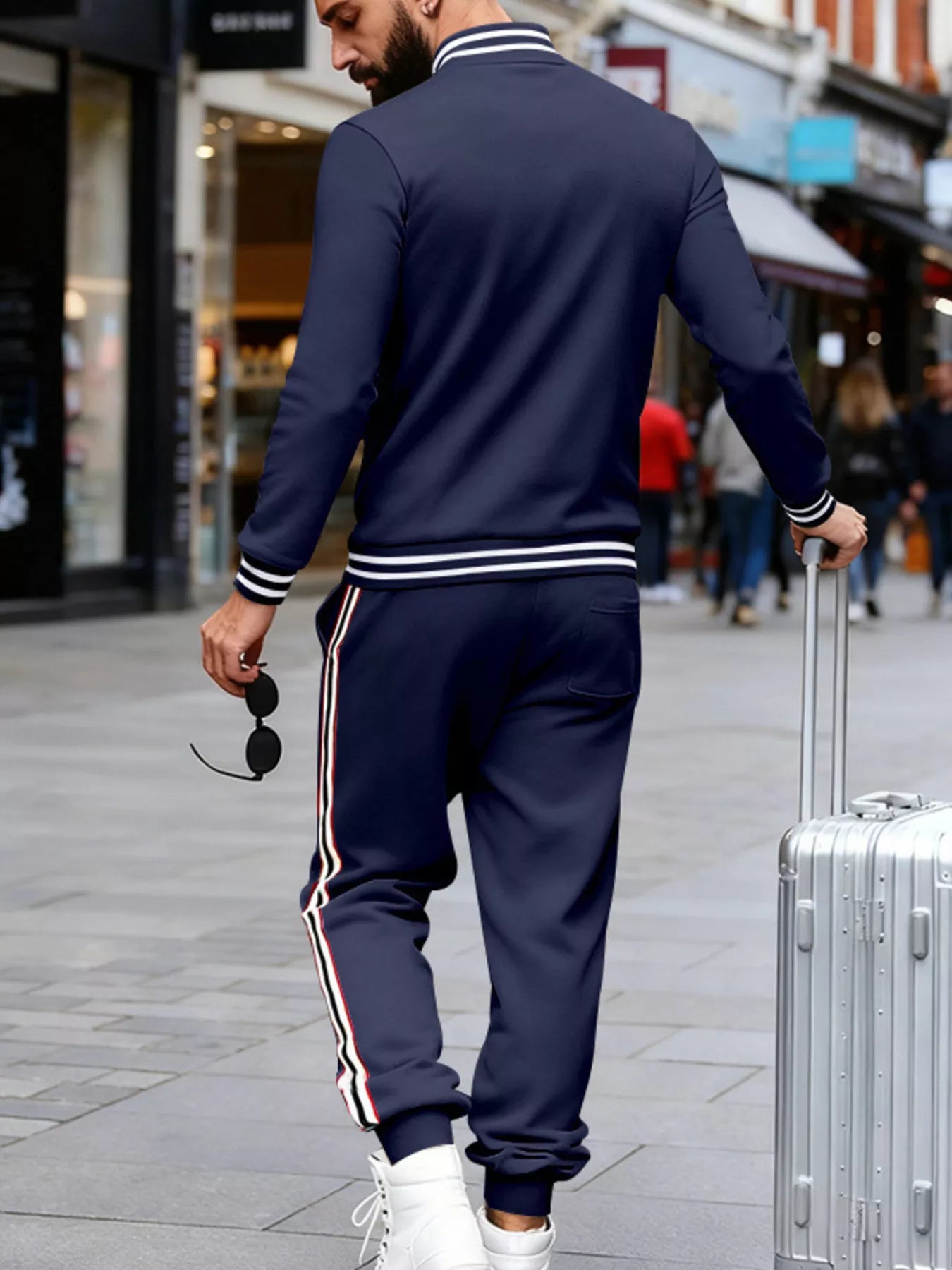 Men's plus size striped snap-down top and pants set by Trendsi, featuring a coordinated full-size casual outfit.