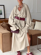 Cotton linen maxi dress with tie neck and flounce sleeves, trendy design from Trendsi, perfect for casual or summer wear.
