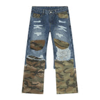 Distressed camouflage patchwork jeans by Trendsi featuring ripped detailing and mixed fabric patches on a casual denim style.