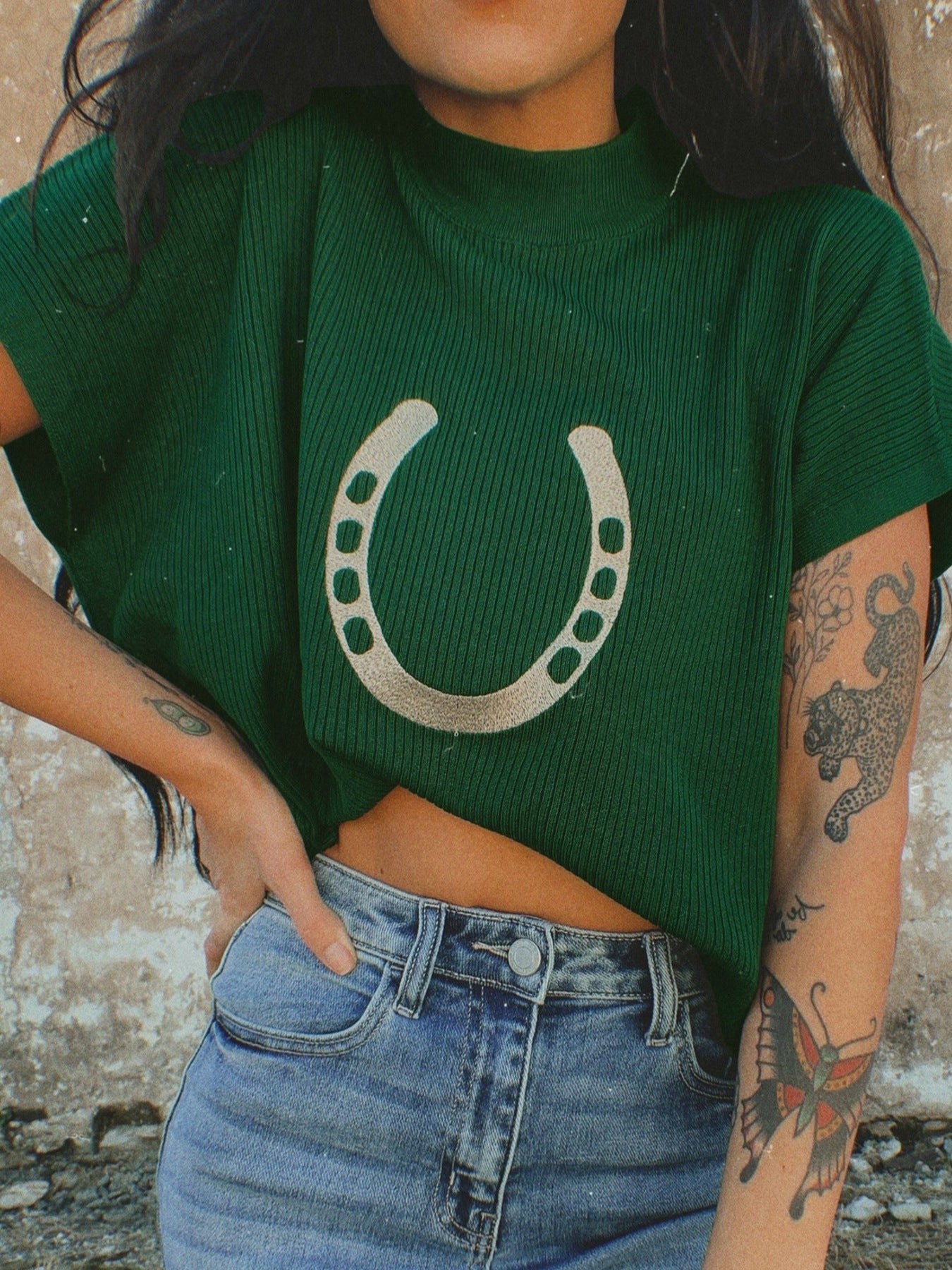 Women's ribbed knit short sleeve sweater with horseshoe graphic design, trendy and comfortable from Trendsi.