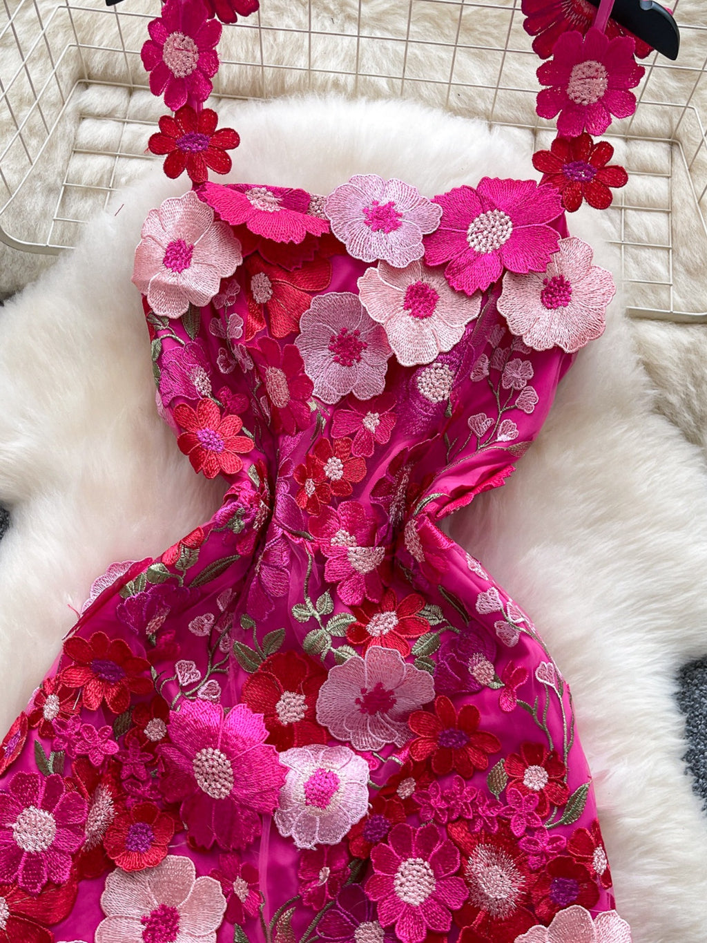 Floral embroidered tie waist mini dress by Trendsi, elegant summer A-line dress with floral embroidery and a feminine silhouette.