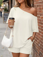 Plus size Trendsi one shoulder top and matching shorts set, featuring a stylish full-size design and comfortable fit.
