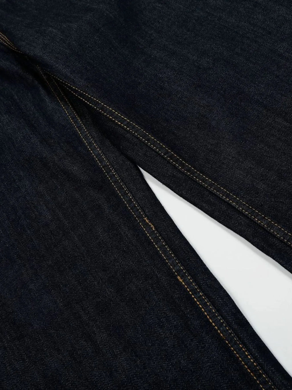Men's wide leg denim jeans by Plush Fashion Shop, showing the relaxed fit and classic blue denim fabric.