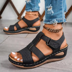 Open toe wedge sandals by Trendsi, stylish footwear with a comfortable wedge heel and open toe design for casual and dressy looks.