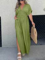 Full size slit V-neck smocked waist maxi dress by Trendsi, featuring a flowing silhouette and stylish design.