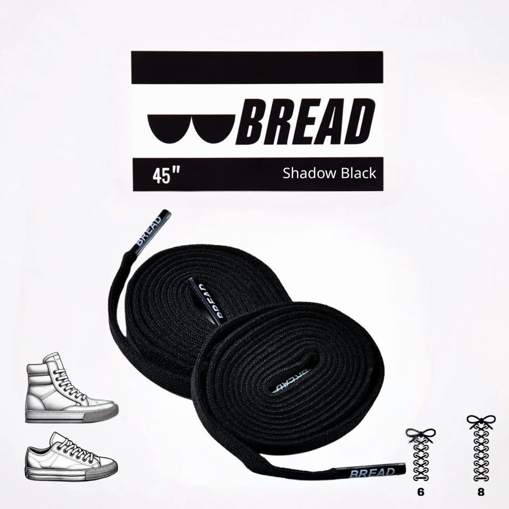 Sparkly black elastic shoelace from Bread's Shadow Black collection, featuring a shiny, flexible design for comfortable fit.