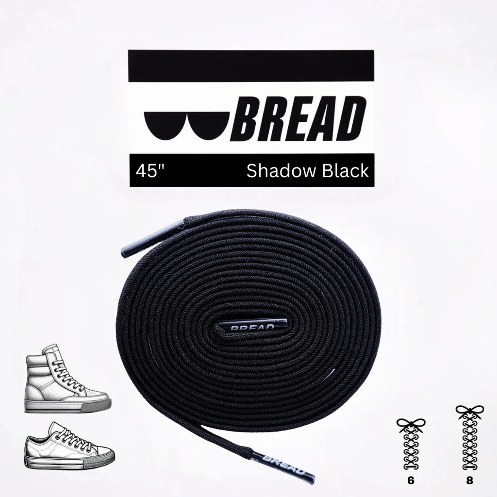 Black elastic shoelace by Bread, shown in classic style with aglets and flexible material for easy slip-on fit.