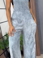 Full size wide leg denim overalls by Trendsi, featuring a one-piece design with adjustable straps and functional pockets.
