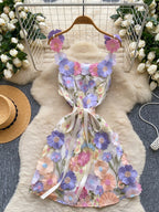 Floral embroidered tie waist mini dress from Trendsi featuring an elegant summer A-line silhouette and vibrant floral details.