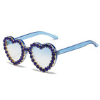Peach heart-shaped rhinestone sunglasses in Y2K INS style, trendy eyewear by FitiqueFit with sparkling rhinestone details.