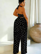 Polka dot halter neck cami with fringe trim pants set featuring a trendy, stylish look on a model.