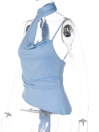 Women's asymmetrical ruched cami top with tie detail, featuring a stylish, fitted design and adjustable straps.