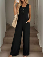 Sleeveless button-front wide-leg jumpsuit from Trendsi, featuring a comfortable and stylish romper design with a relaxed fit.
