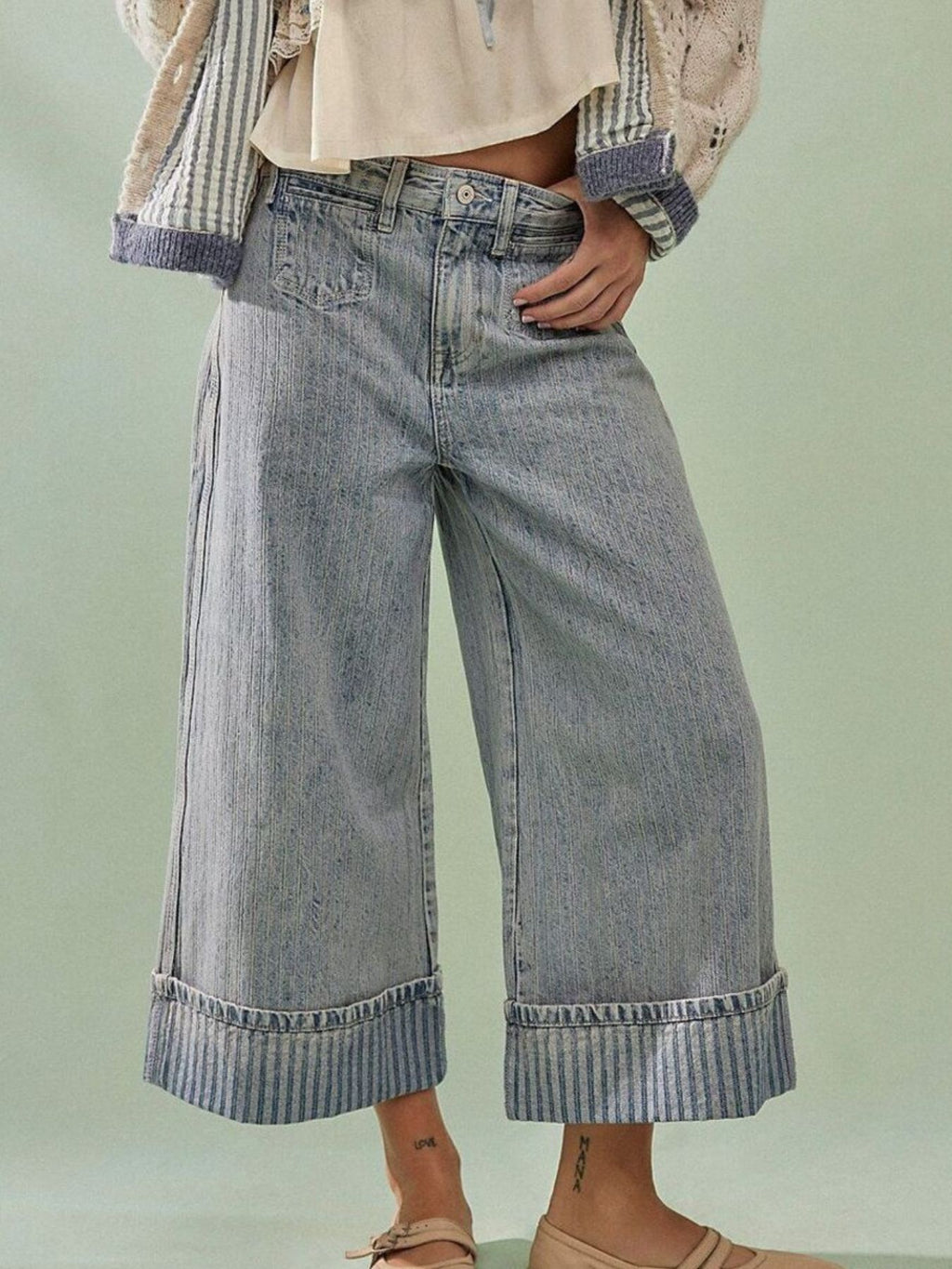 Wide-leg cropped denim jeans from Plush Fashion Shop, showing the relaxed fit and light blue color on a mannequin.