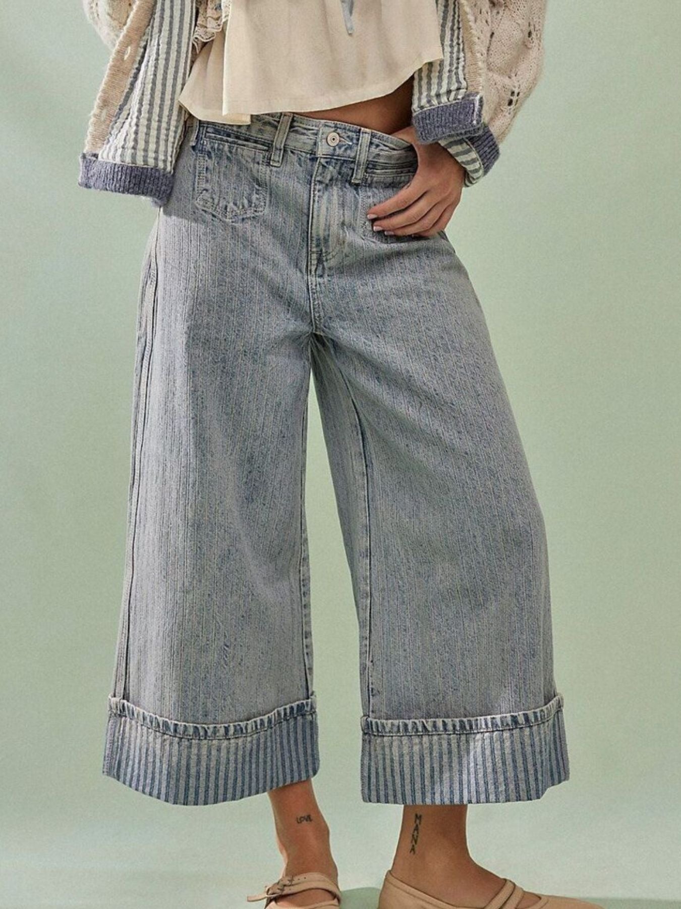 Wide-leg cropped denim jeans from Plush Fashion Shop, showing the relaxed fit and light blue color on a mannequin.