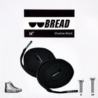 Sparkly black elastic shoelace by Bread, designed for easy slip-on sneakers, featuring a sleek, elastic design with a subtle shimmer.