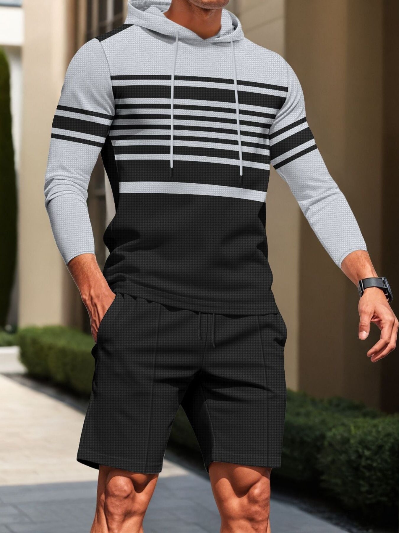 Men's full size striped hoodie and shorts casual set by Trendsi, featuring a comfortable, stylish matching hoodie and shorts for men.