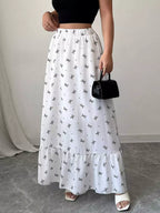 Trendsi bowknot print ruffle hem maxi skirt featuring a flowy fabric and feminine design with bow accents and ruffled hem.