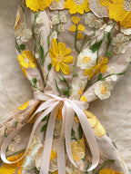 Floral embroidered tie waist mini dress in an A-line silhouette, perfect for elegant summer occasions, by Trendsi.