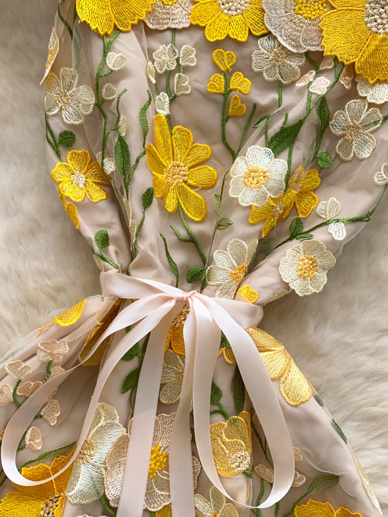 Floral embroidered tie waist mini dress in an A-line silhouette, perfect for elegant summer occasions, by Trendsi.