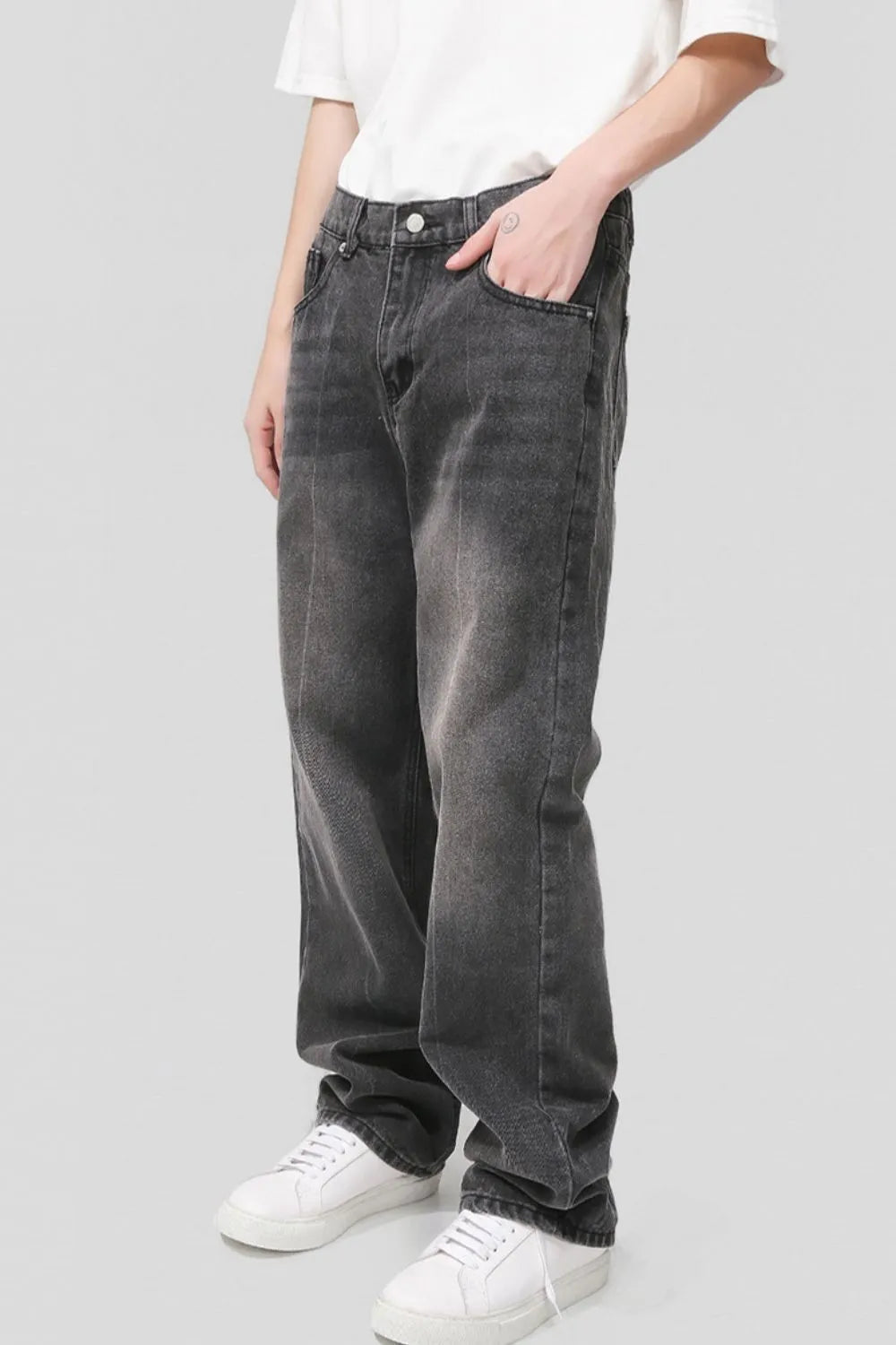 Plush Fashion Shop baggy denim jeans with multiple pockets, relaxed fit, and classic blue wash, displayed on a hanger.
