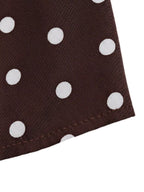 Polka dot halter neck mini dress by Trendsi, featuring a stylish halter neckline and playful polka dot pattern.