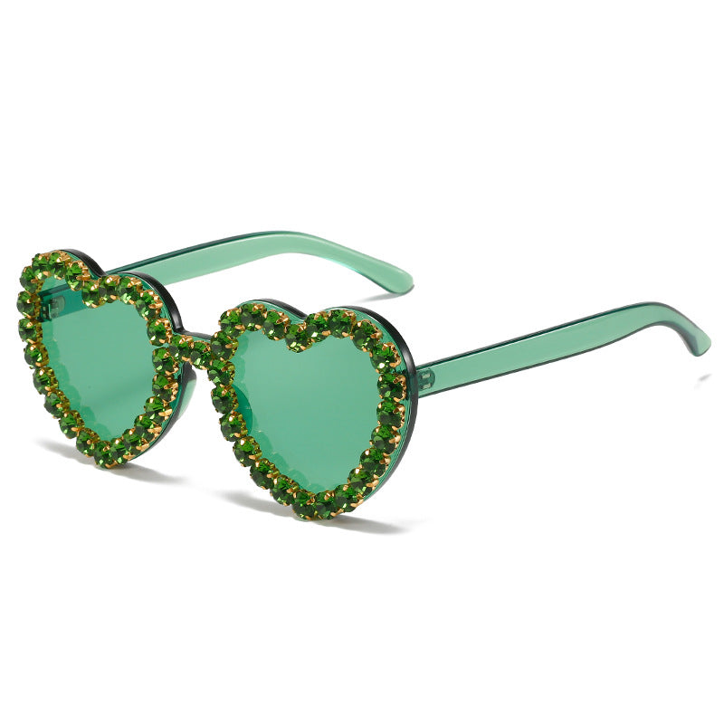 Peach heart-shaped rhinestone sunglasses with Y2K style frame, fashionable eyewear by FitiqueFit, vibrant and trendy accessory.