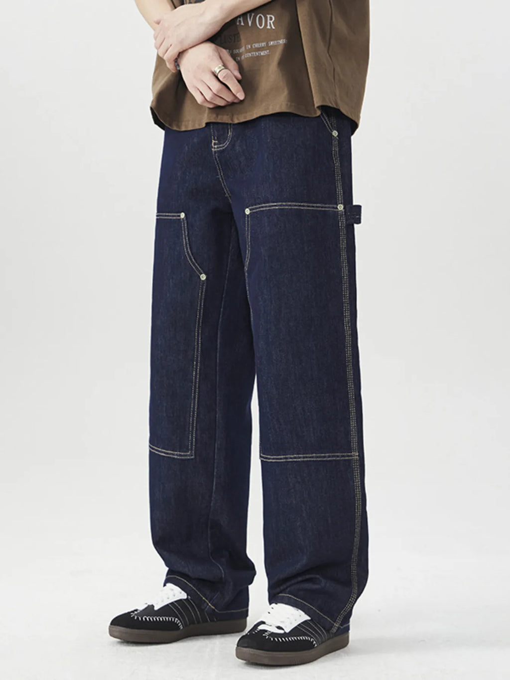 Men's wide leg cargo jeans from Trendsi featuring a relaxed fit, multiple pockets, and durable denim fabric.