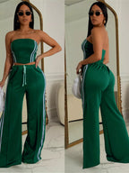 Trendsi sleeveless tube top and wide-leg pants set, featuring a stylish matching outfit with a fitted tube top and flowy pants.