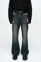 Plush Fashion Shop denim bootcut jeans with front and back pockets, classic blue wash, and relaxed fit.