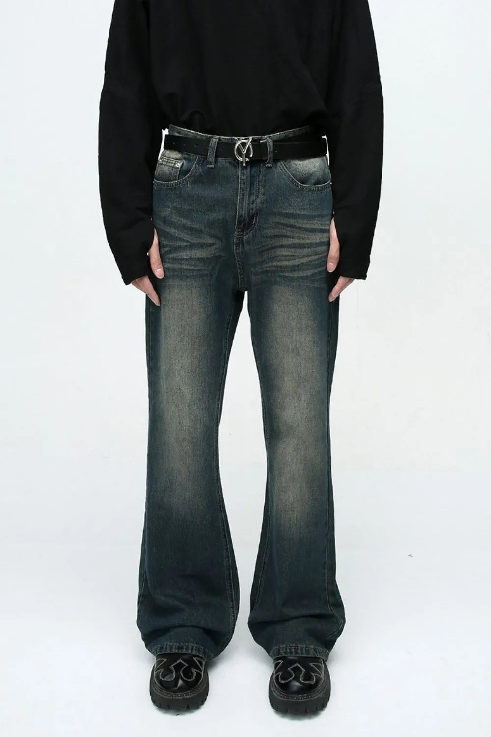 Plush Fashion Shop denim bootcut jeans with front and back pockets, classic blue wash, and relaxed fit.