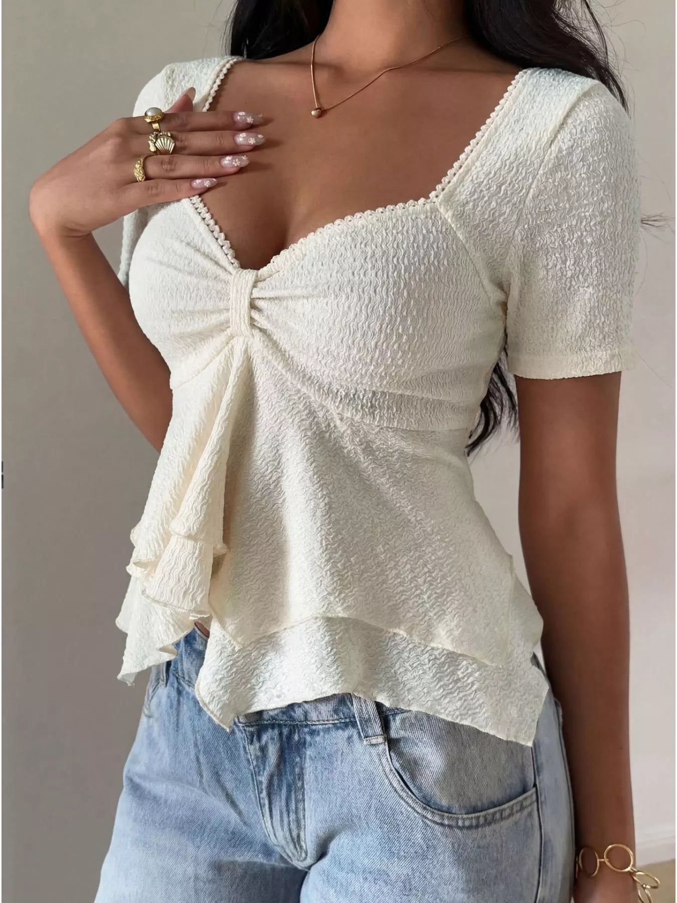 Sweetheart neck layered ruffle top by Trendsi, featuring a feminine design with ruffle details and a flattering neckline.