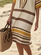Plus size women's striped midi dress by Trendsi featuring half-sleeves, casual chic style, perfect for everyday wear.