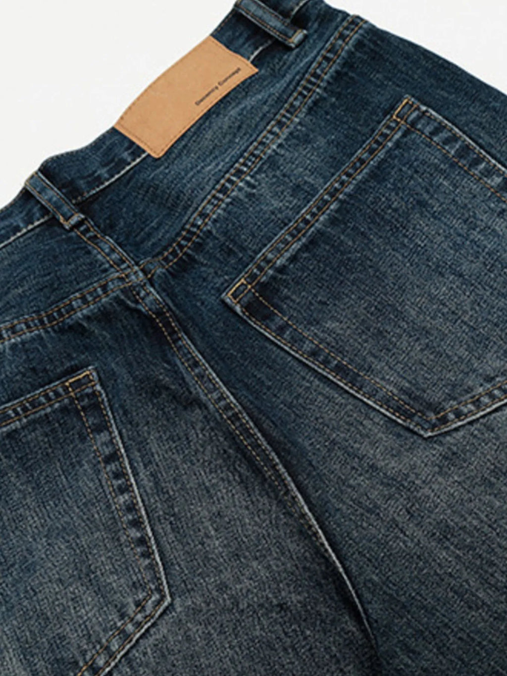 Men's washed wide-leg jeans by Trendsi, showing relaxed fit with faded denim and stylish casual design.