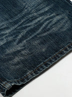 Men's washed wide-leg jeans by Trendsi, featuring a relaxed fit and faded denim look, displayed on a neutral background.
