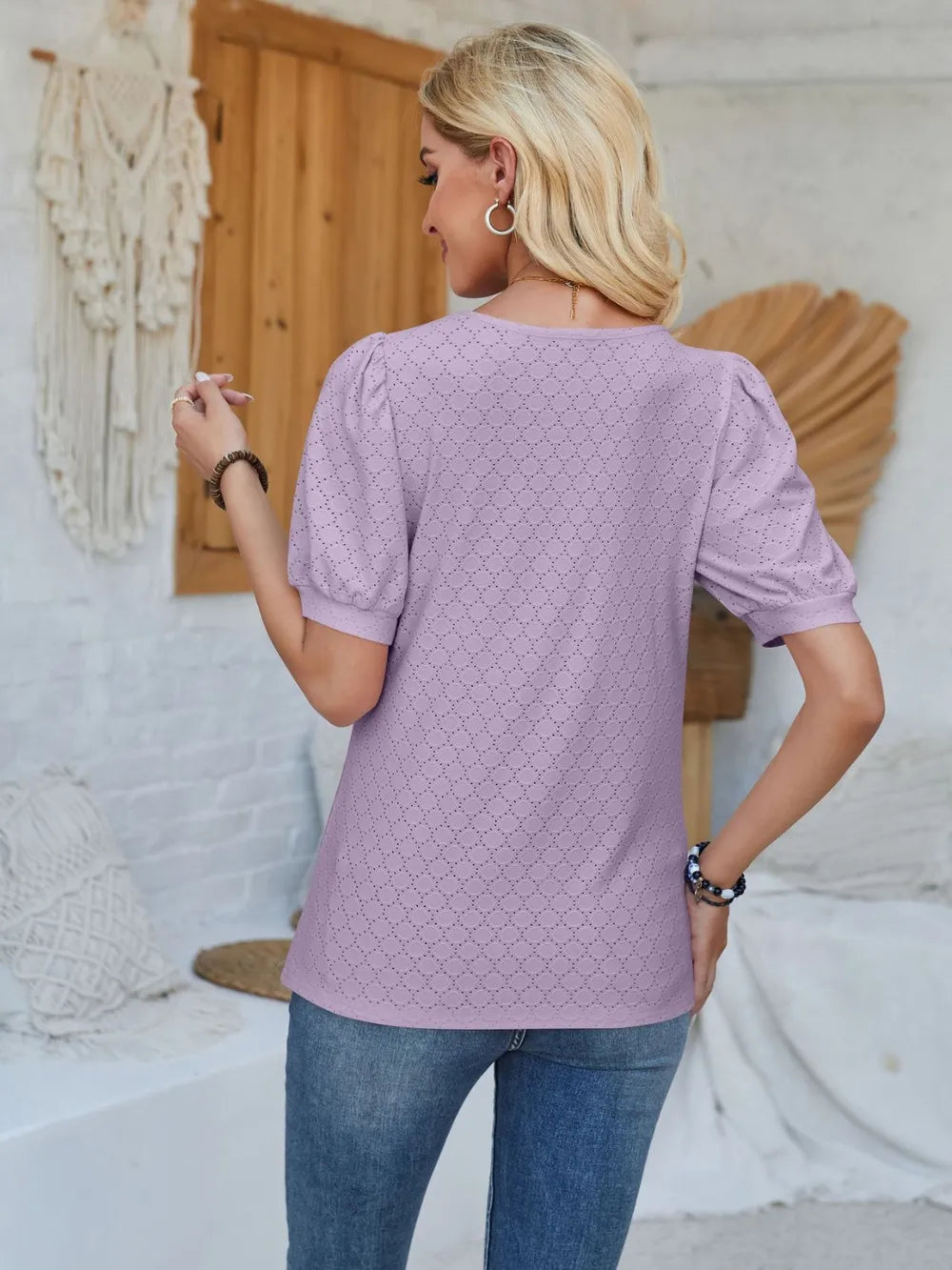 Trendsi eyelet asymmetrical neck short sleeve T-shirt, stylish tops with unique neckline and lightweight fabric, black color.