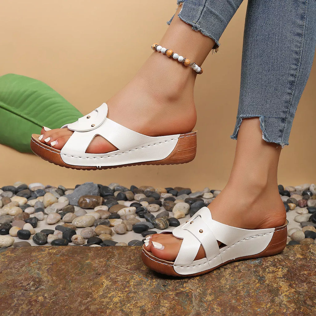 Open toe wedge sandals by Plush Fashion Hub featuring a stylish design with a comfortable sole and trendy open-toe style.